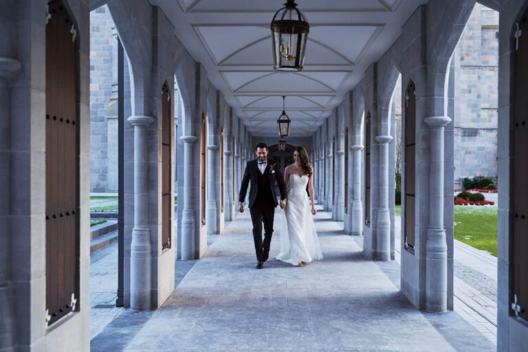 A couple walking the colonnade, Adare Manor