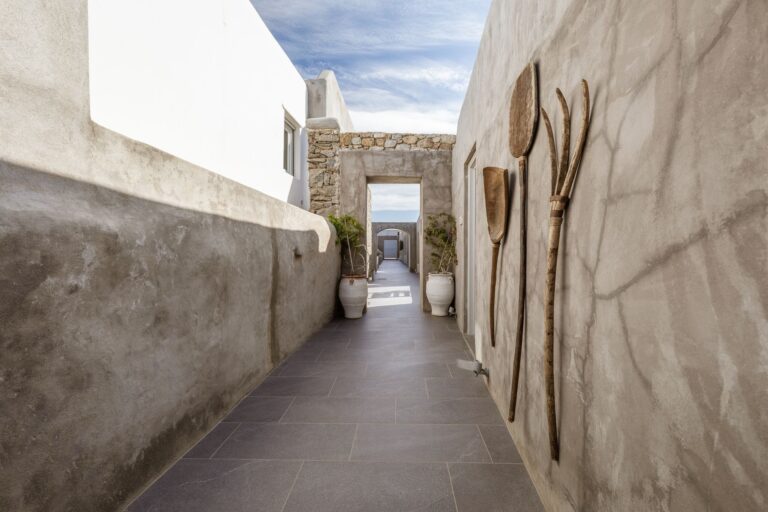 A stone passageway between the cottages