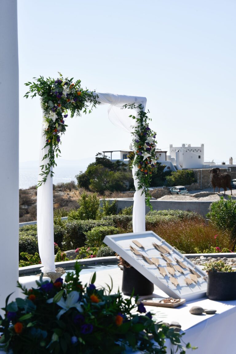 A flower-framed ceremony arch