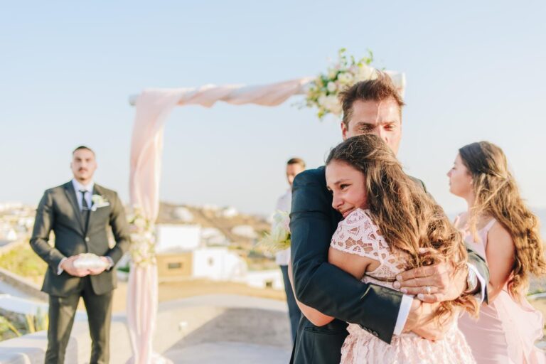 A couple embrace after their ceremony