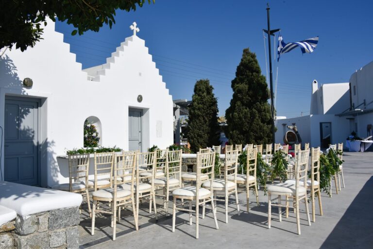 Ceremony chairs set out beside the chapel
