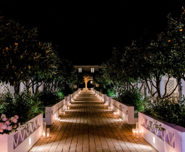 Candlelit walkway through a garden at night, Algarve Wedding Planners