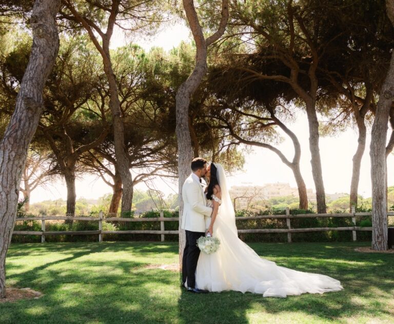 Couple among pine trees in a garden, Algarve Wedding Planners