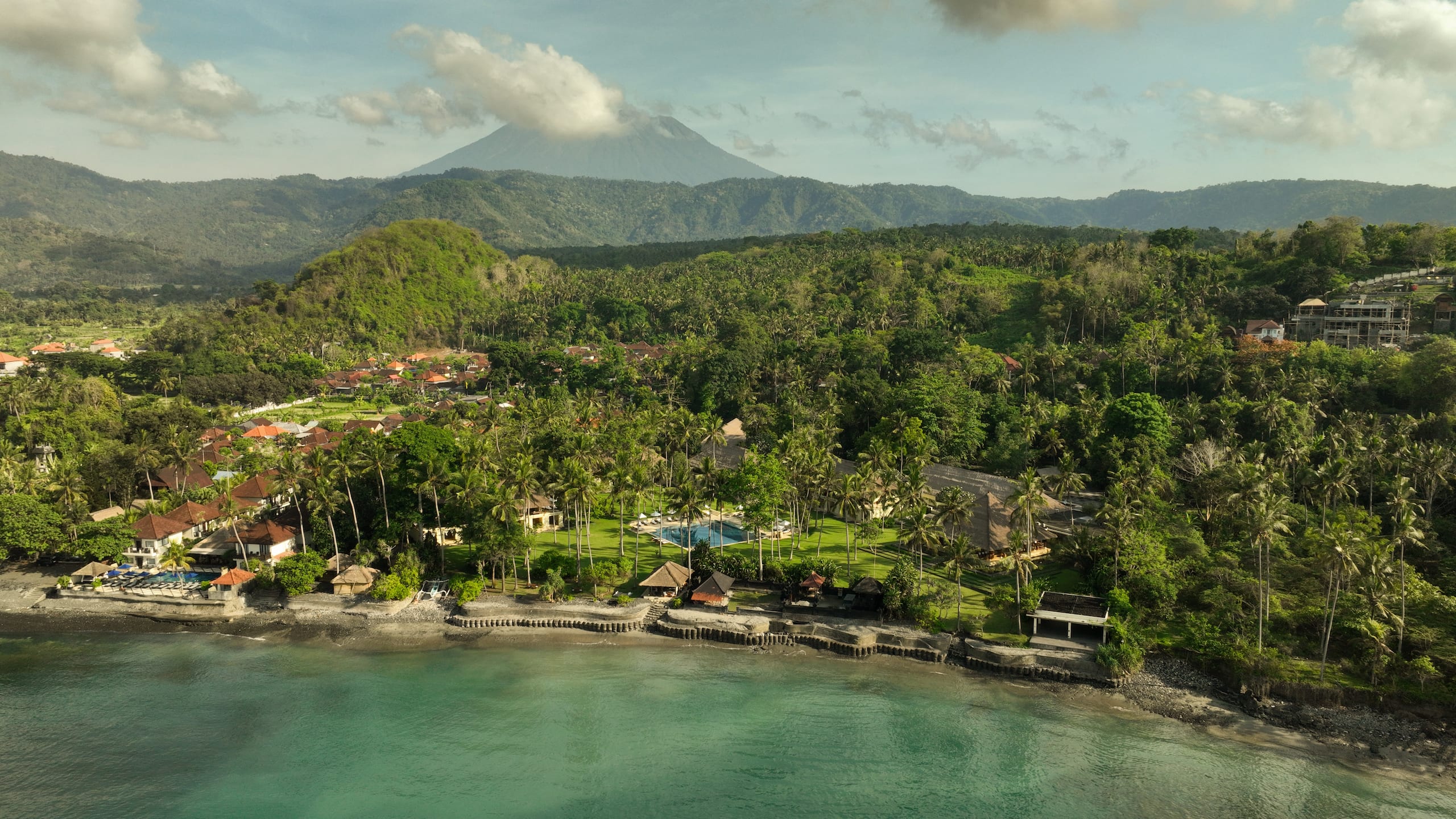The resort and the east coast with hills beyond, Alila Manggis