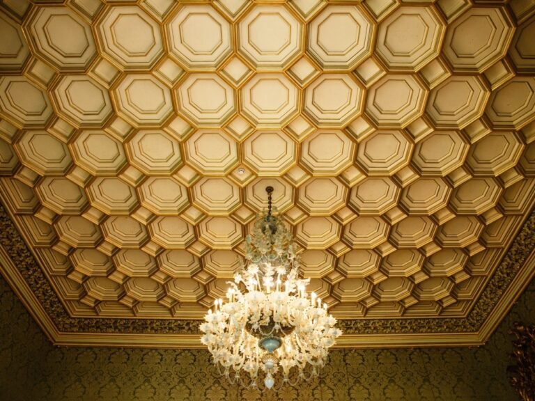 A gilded, coffered ceiling with a chandelier at its centre, Allerton Castle