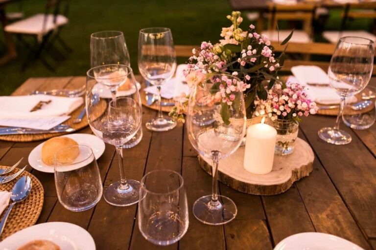 A long banquet table at Amagatay, by candlelight, Amagatay Menorca