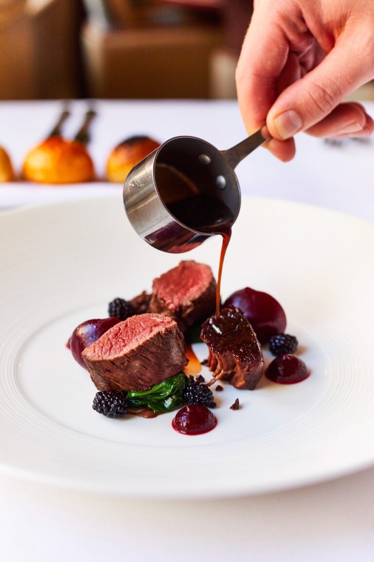A venison main course, the sauce being poured at the table, Amberley Castle