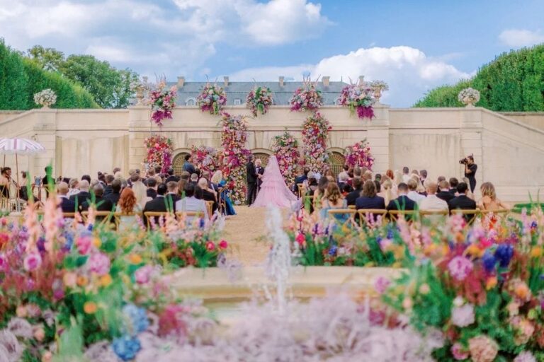An outdoor ceremony against the chateau facade, Hôtel Château du Grand-Lucé, Amie Bone