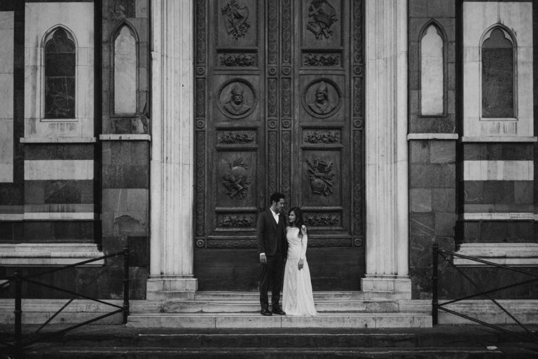 The carved doors of a Florence church, in black and white — Joel and Michelle, Andrea & Federica