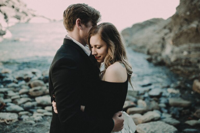 An embrace on the rocks — Garrett and Ally, Vernazza, Andrea & Federica