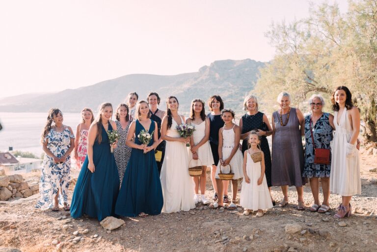 The wedding party, the mountains behind them, Andreas Markakis Photography