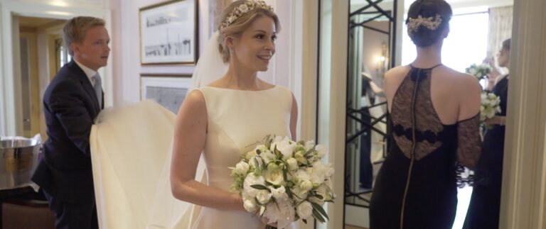 The bride, with her bouquet, at Claridge's, Andrei Weddings