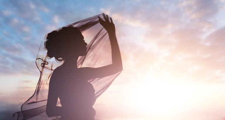 A bride's silhouette, at sunset, Andrei Weddings