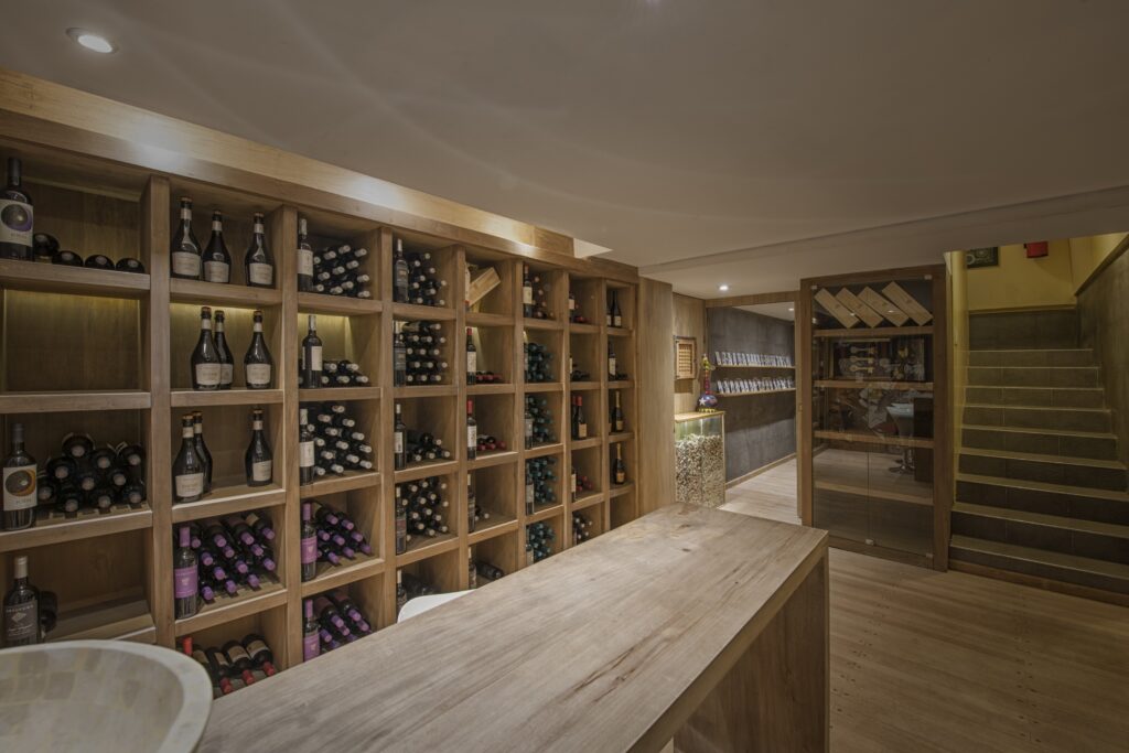 The private cellar with its timber wine racks, Antucura Wine Estate
