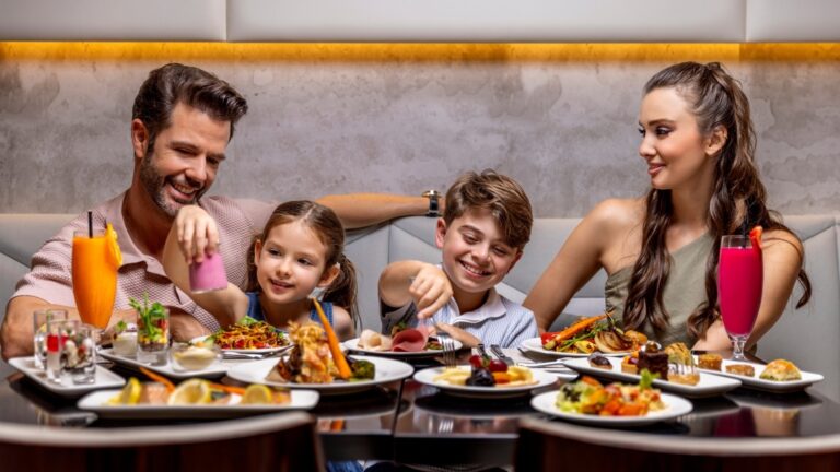 A family at a restaurant table, Arjaan by Rotana Dubai Media City