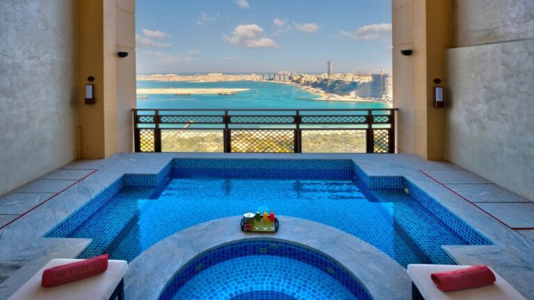 A suite plunge pool and balcony looking over the sea, Arjaan by Rotana Dubai Media City
