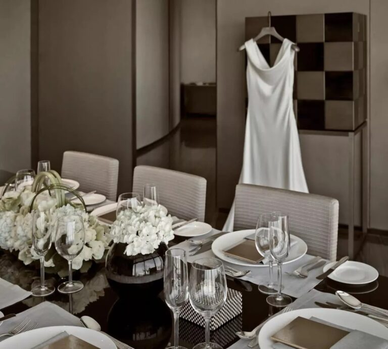 A wedding dress and floral table setting, Armani Hotel Dubai