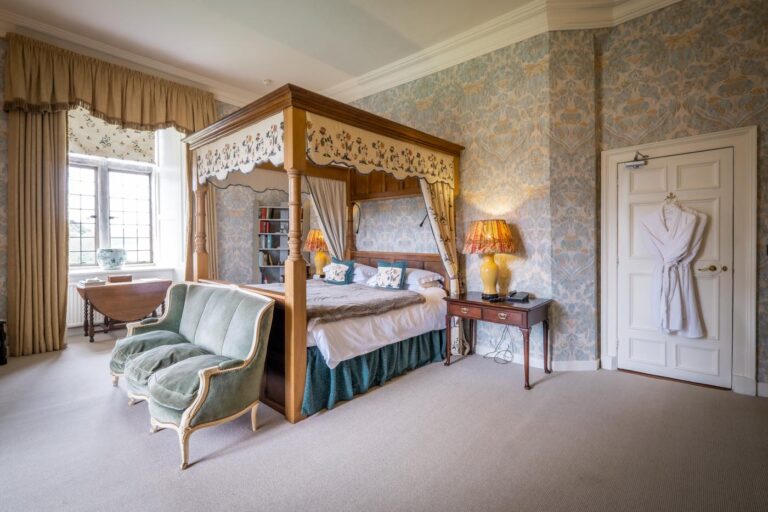 The Admiral's Room, a first-floor bedroom with a carved four-poster bed, Askham Hall