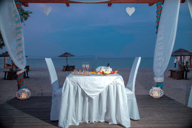 A table for two on the beach deck, Atlantis Hotel
