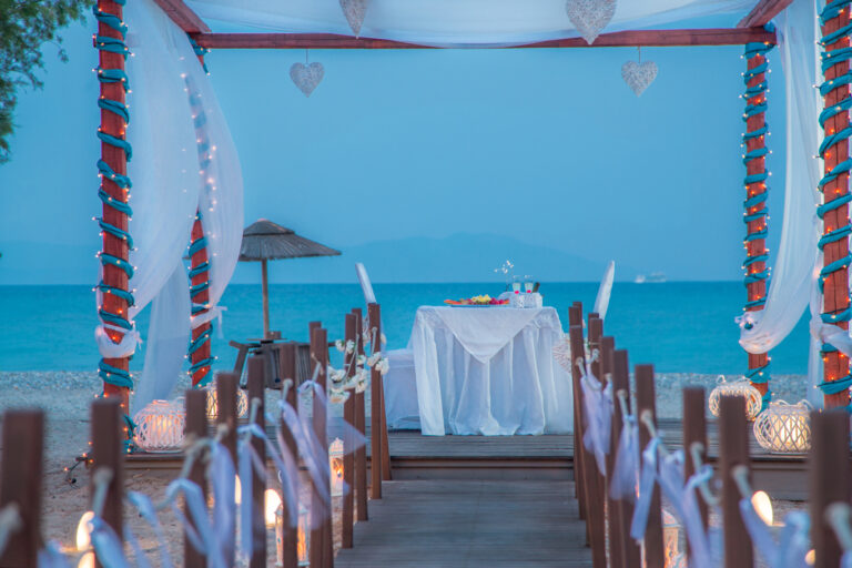 A beach dinner table framed by drapes, Atlantis Hotel