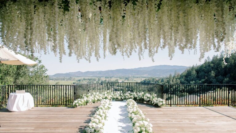 The Ceremony Terrace, dressed with a wisteria floral installation, Auberge du Soleil