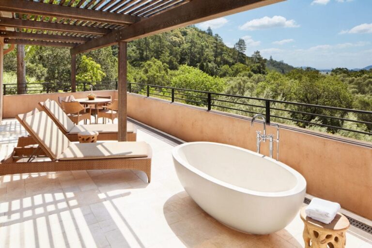 A private terrace with an outdoor soaking tub, Auberge du Soleil