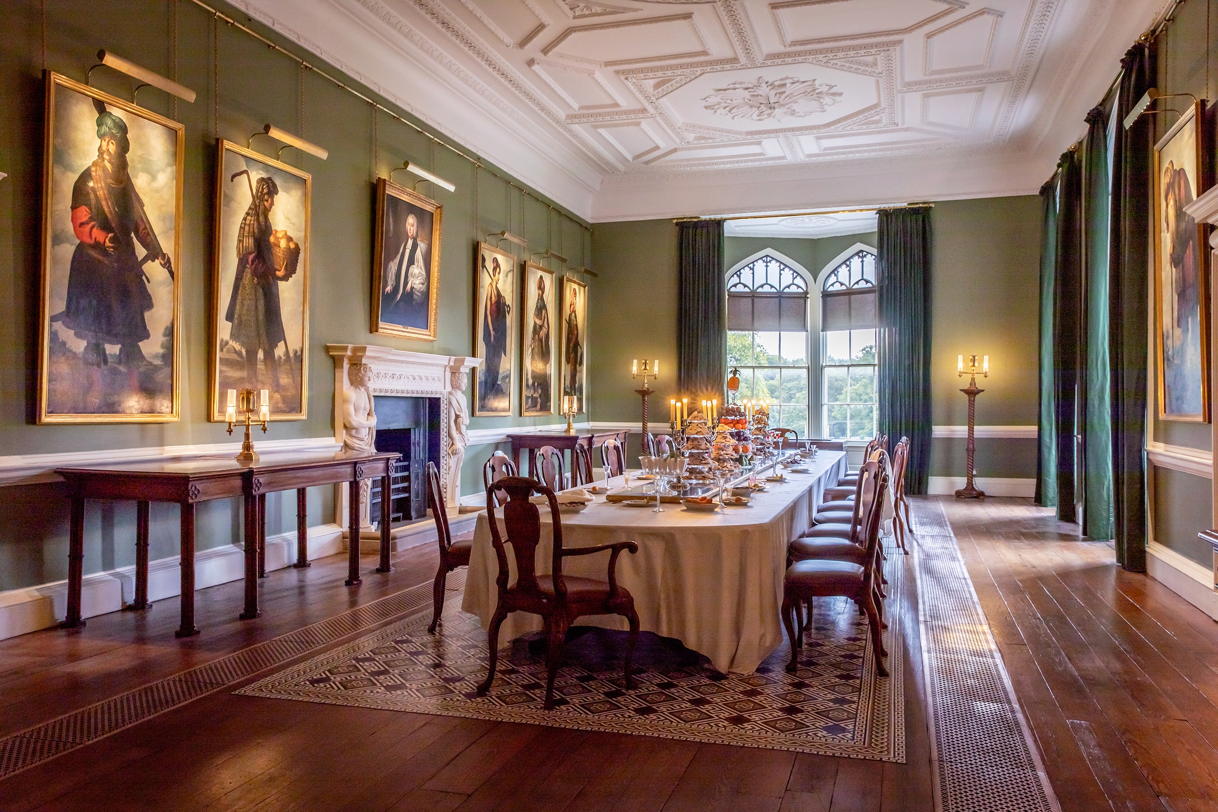 The Long Dining Room set for a candlelit private dinner, Zurbaran portraits above the panelling, Auckland Castle