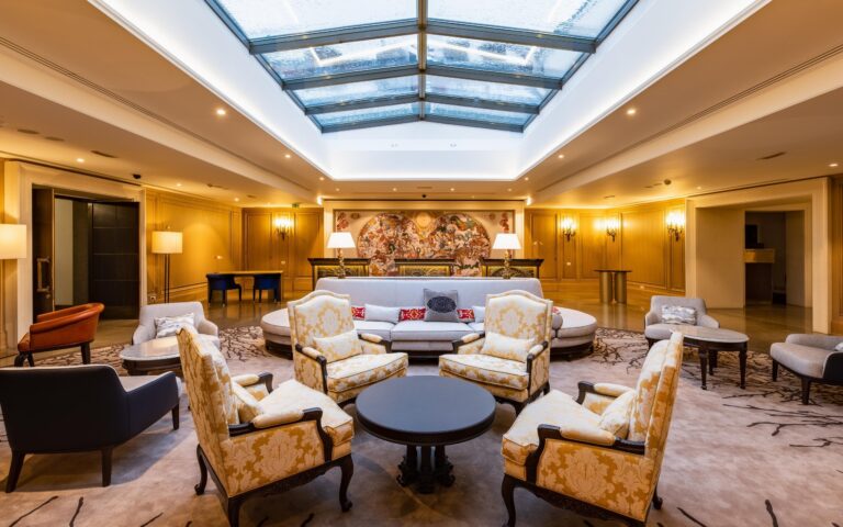 Lounge beneath a glass ceiling, Augustine Hotel, Prague