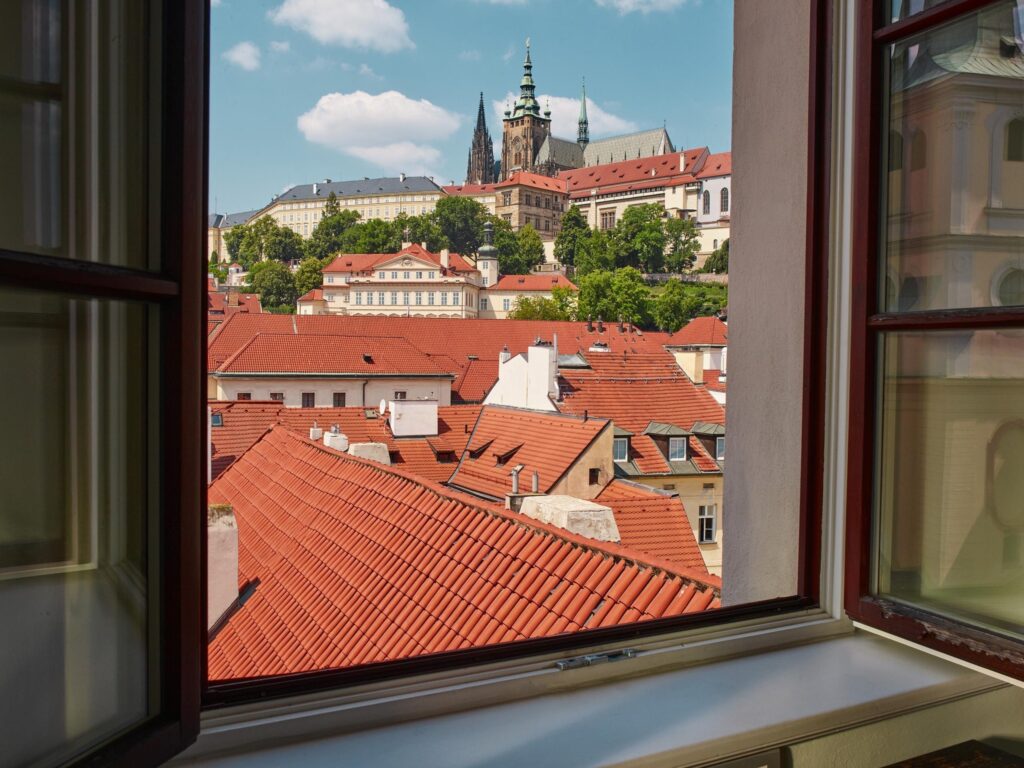 View over the Lesser Town roofs towards Prague Castle, Augustine Hotel, Prague