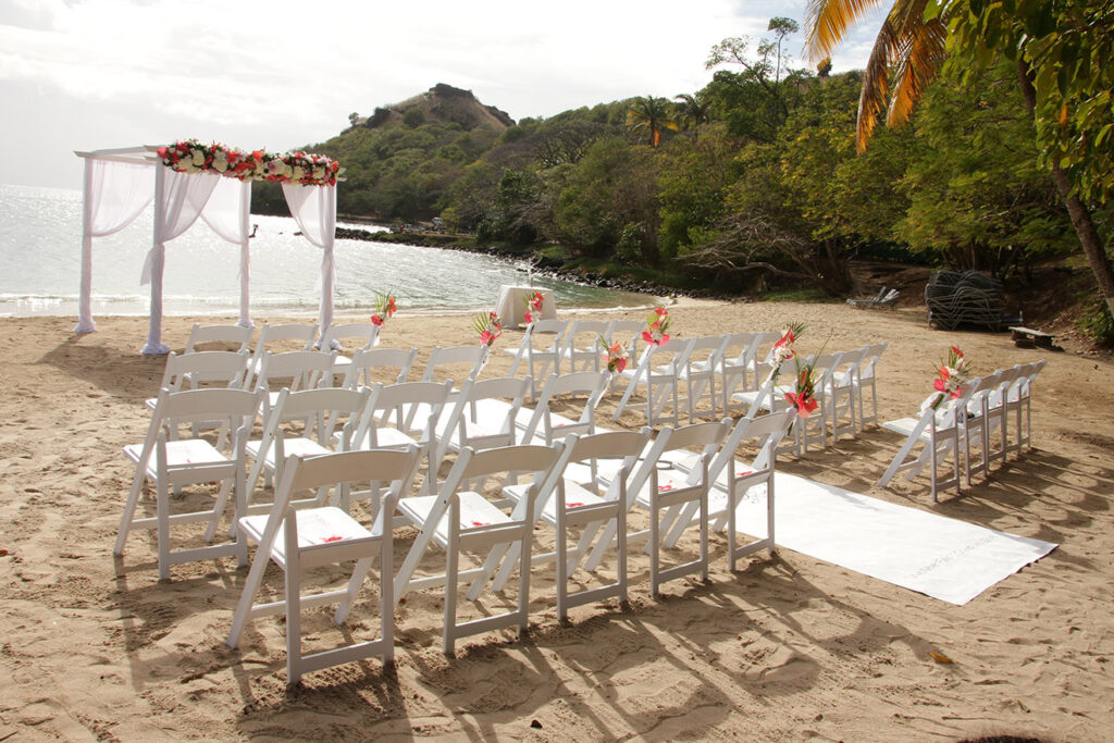 A beach ceremony set up on a sheltered cove