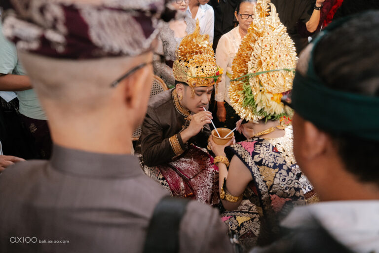 Balinese ceremony ritual with the couple in traditional dress, Sanur, Bali, Axioo Bali