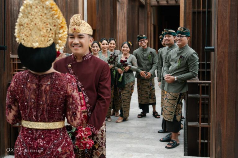 Balinese bride and groom in traditional dress with the wedding party, Sanur, Bali, Axioo Bali