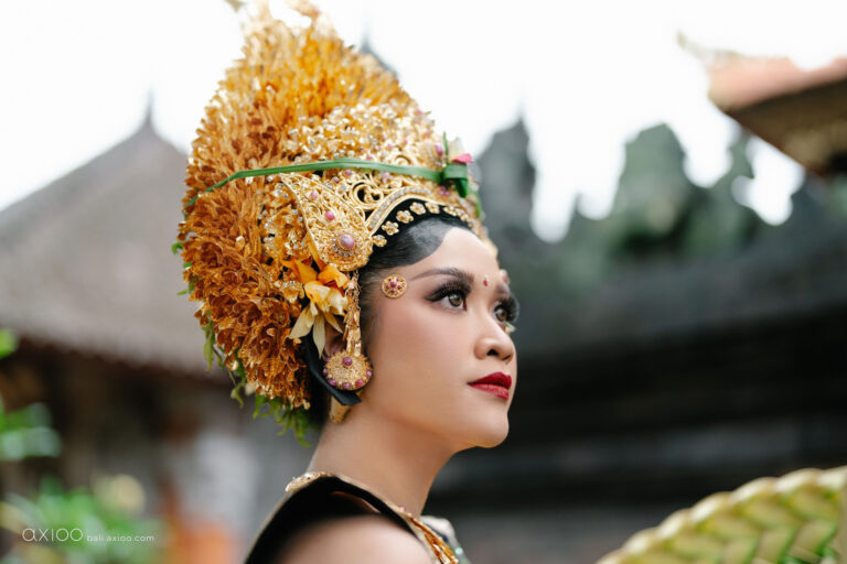 Bride in a gold Balinese headdress looking into the distance, Sanur, Bali, Axioo Bali