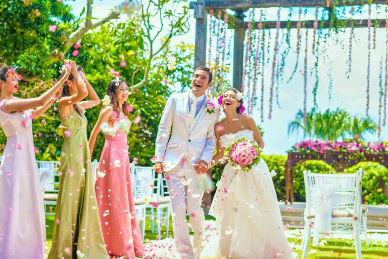 Couple greeted with petals after a garden ceremony, Ayana Estate Bali