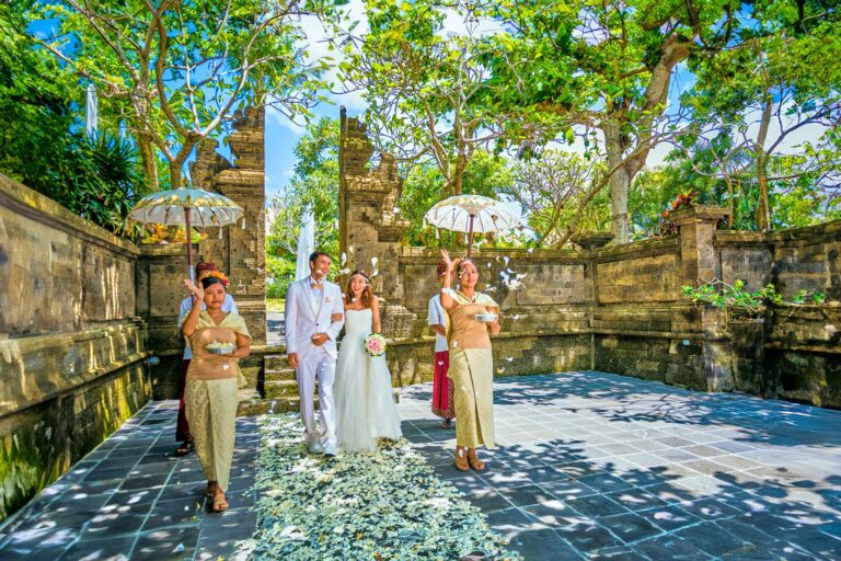 Balinese wedding procession with parasols, Ayana Estate Bali