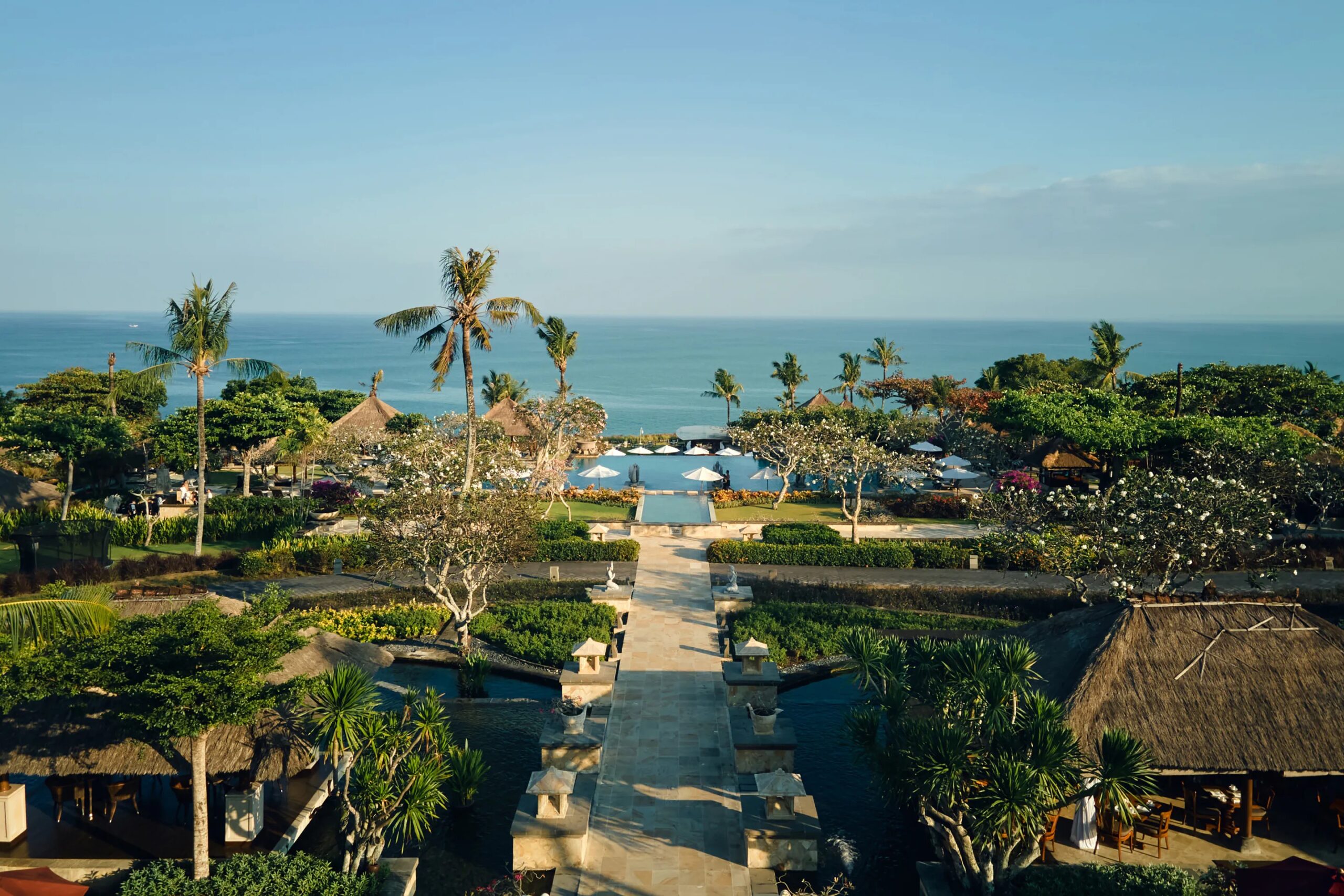 Resort gardens and pools running down to the Indian Ocean, Ayana Estate Bali