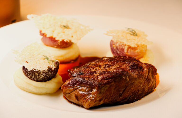 A beef fillet with pommes puree and a crisp tuile, Baglioni Resort Cala del Porto