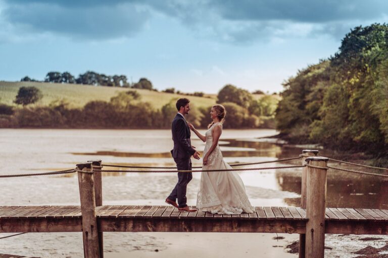 A couple on the jetty on the estuary, Ballinacurra House