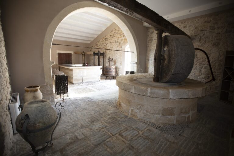 Old stone millstone and press room with vaulted ceiling, Ballium Luxury Relais