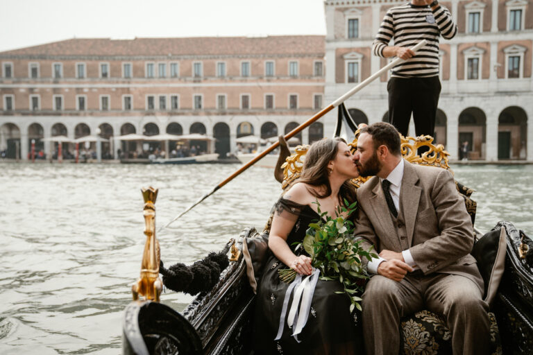 A kiss in a gondola on an elopement in Venice, Barbara Zanon Photography