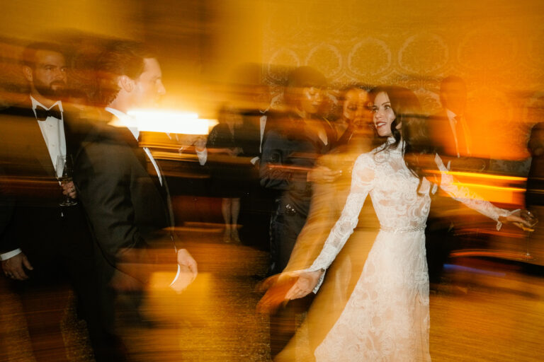 The bride dancing, caught with a slow shutter, at the reception in Venice, Barbara Zanon Photography