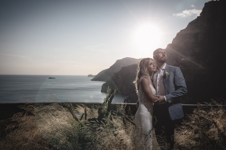 An embrace on the cliffs above the Amalfi Coast at golden hour, Bella Sposa