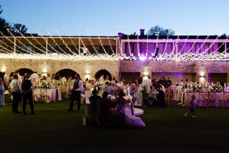 An evening reception under festoon lighting at Corfu Golf Club, Belli Momenti