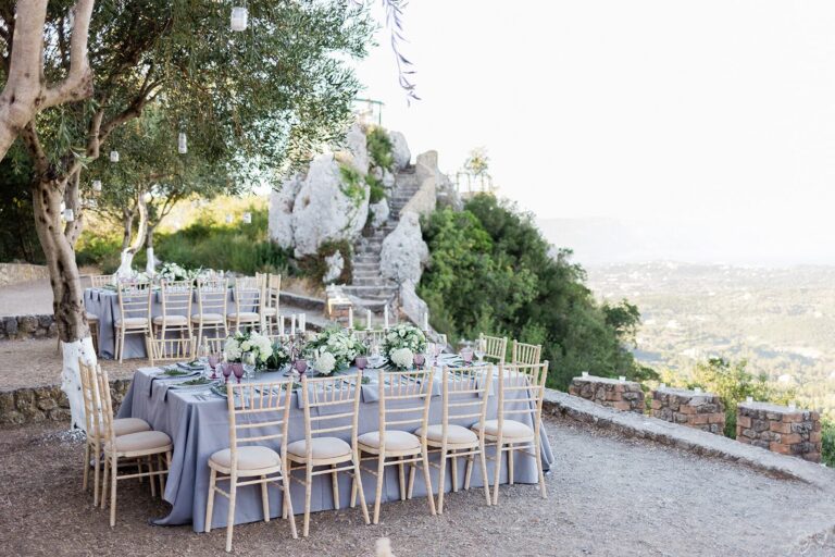 A long reception table above the Ionian landscape at Kaizer's Throne, Corfu, Belli Momenti