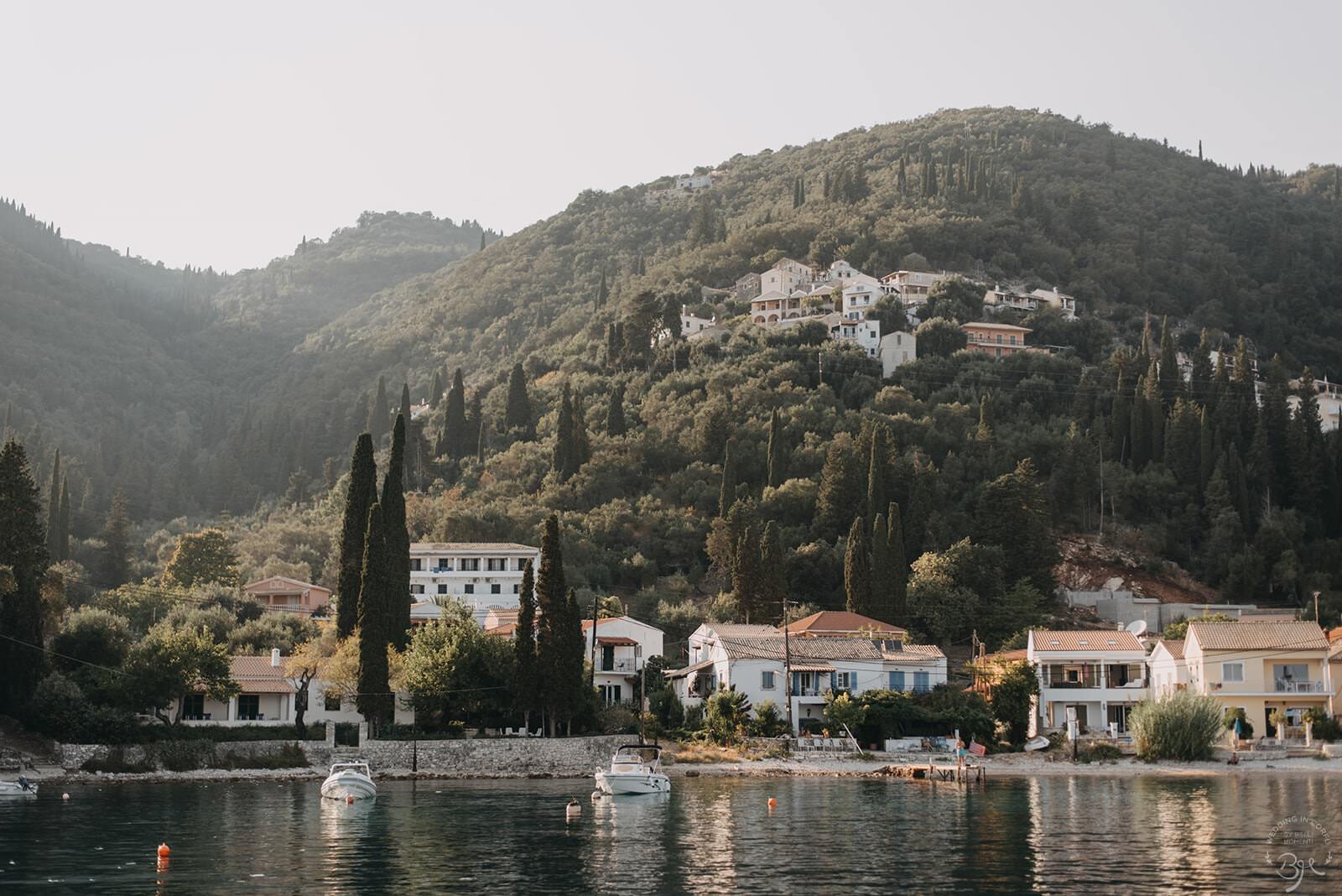 A wooded bay where a Corfu microwedding began with cocktails, Belli Momenti