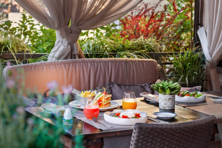 Breakfast served on a terrace, Belmond Grand Hotel Europe