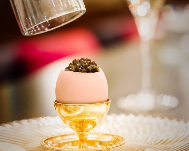 Caviar served in an eggshell at L'Europe, Belmond Grand Hotel Europe