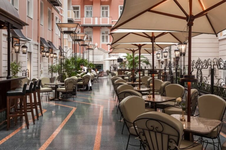 The courtyard terrace with parasols, Belmond Grand Hotel Europe