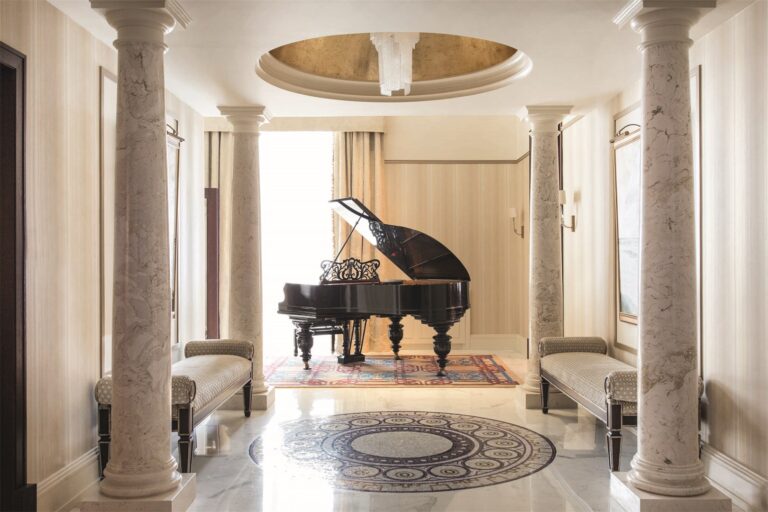 The music room with grand piano in the Imperial Suite, Belmond Grand Hotel Europe