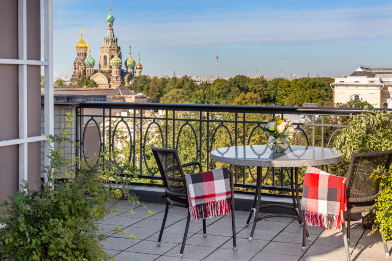 A suite terrace overlooking the rooftops, Belmond Grand Hotel Europe